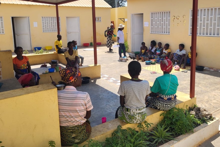 Angolan women gathered in courtyard of Maternal Waiting Home